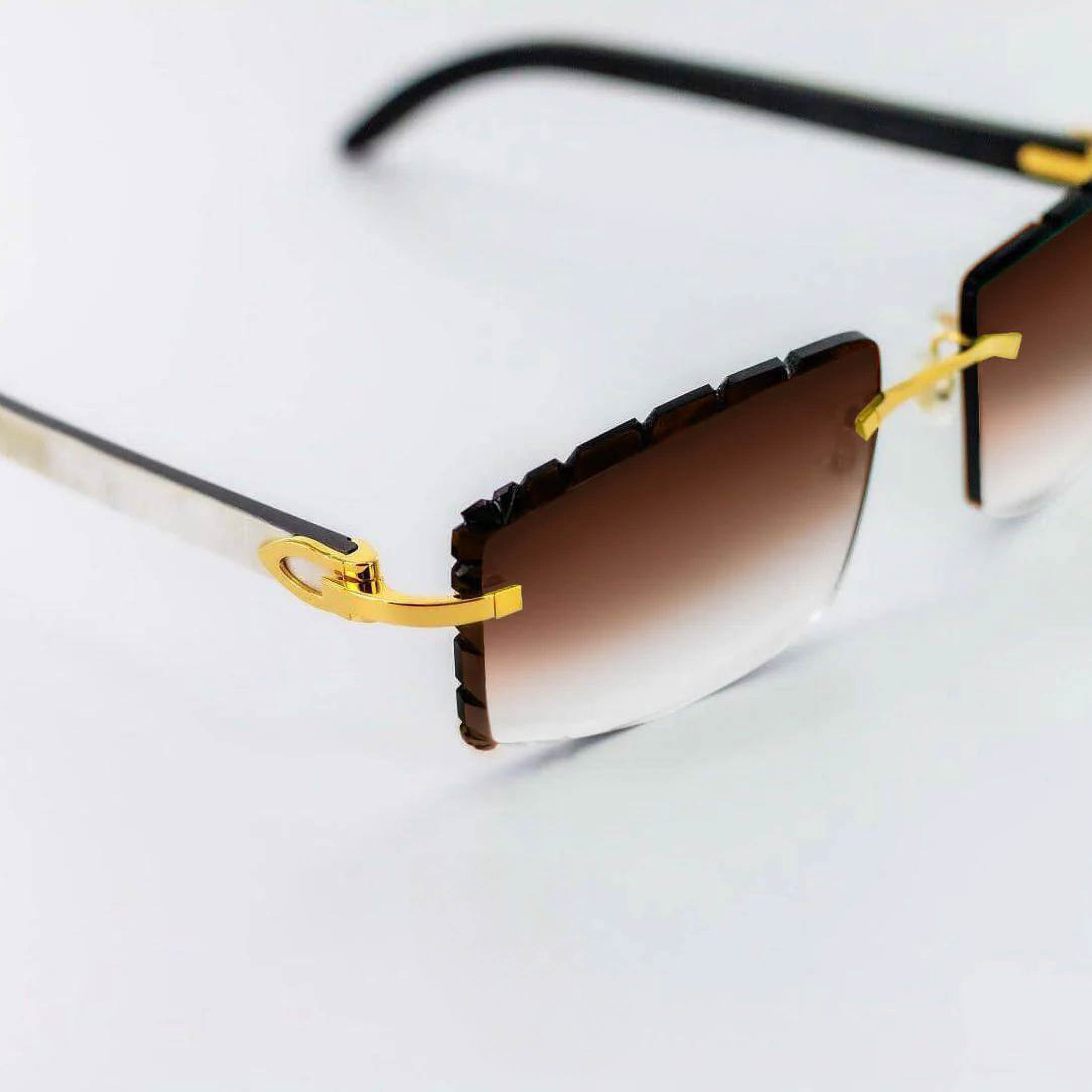 Authentic Cartier White Horn Sunglasses CT0046O-001 • Iconic White Buffs • Gold/Platinum Hardware Options • Gradient Brown or Diamond Cut Lenses • Luxury Eyewear • Genuine Cartier with Certificate