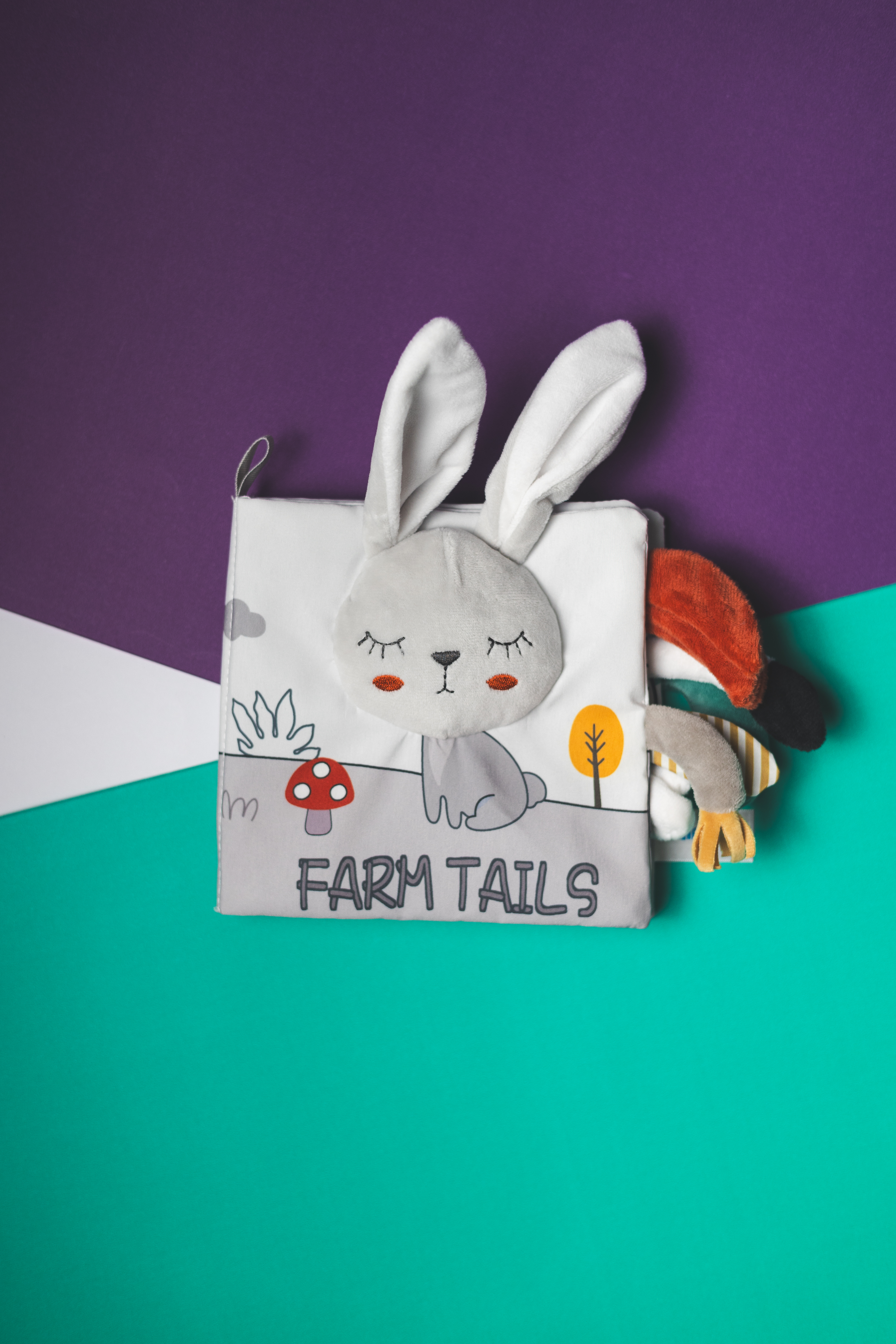 Libro Sensorial de Tela para Bebé – Con Colitas de Animal, Suave y Mordible