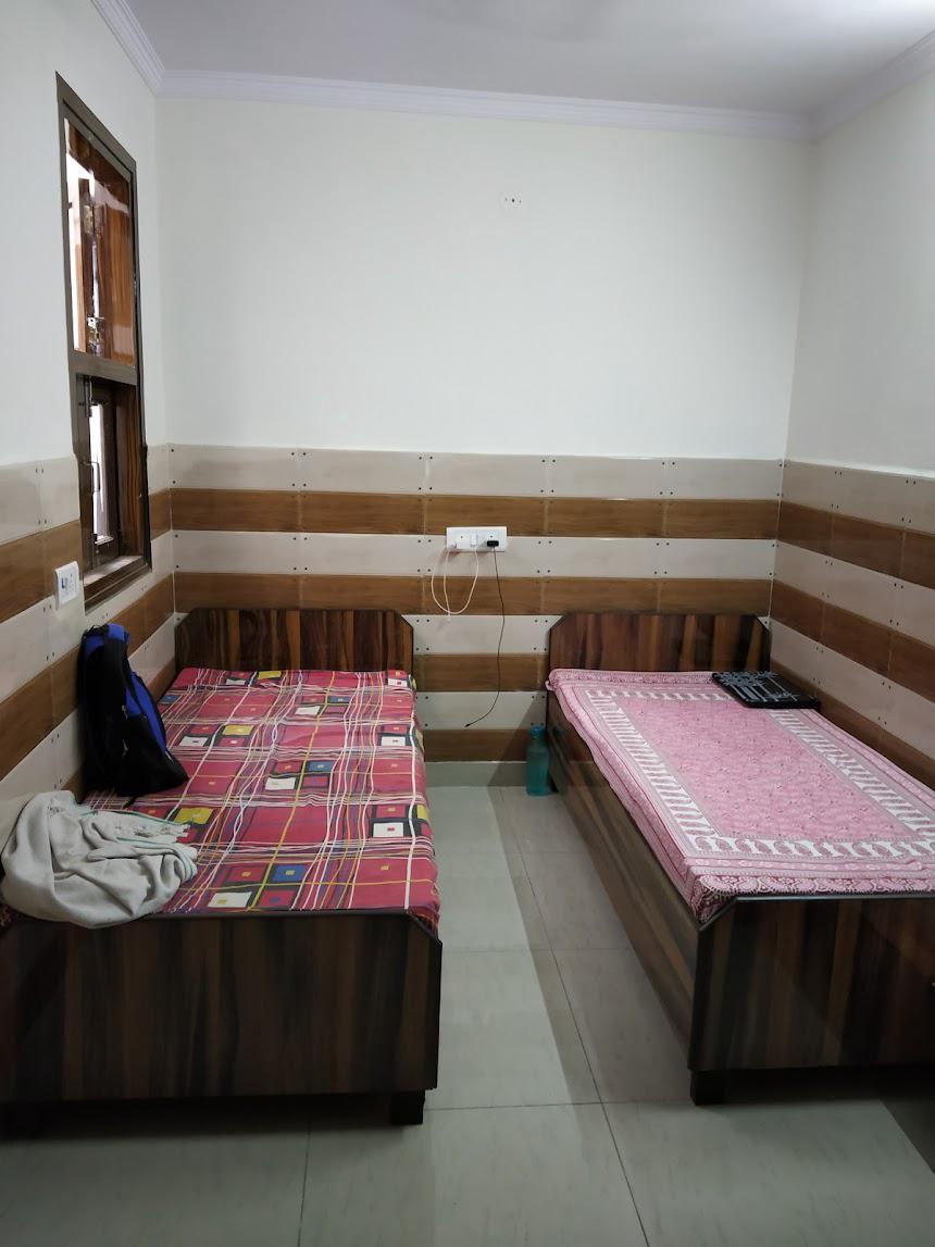Double Sharing Room with Shared Washroom