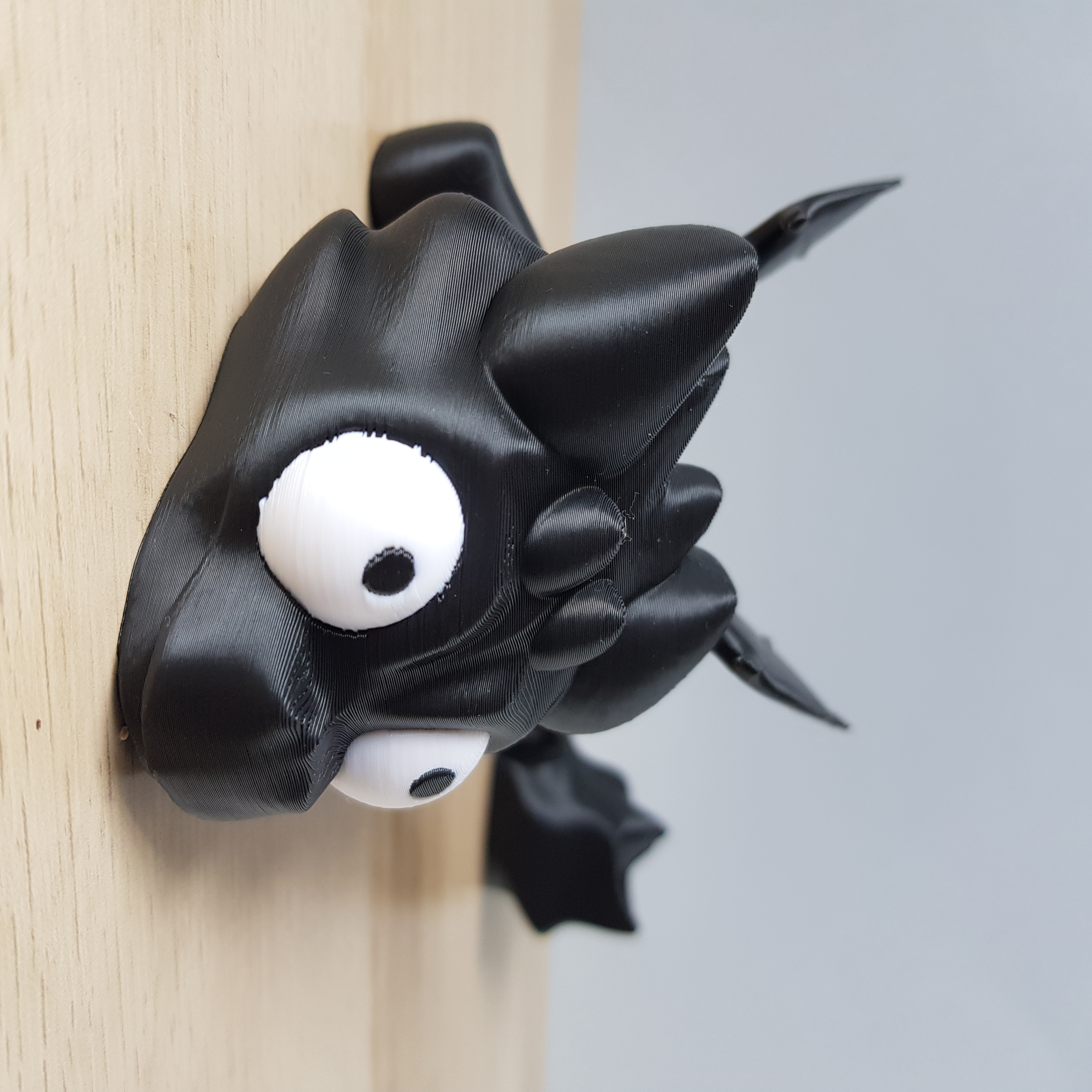 Dragão preto articulado anti-stress impresso em 3D 