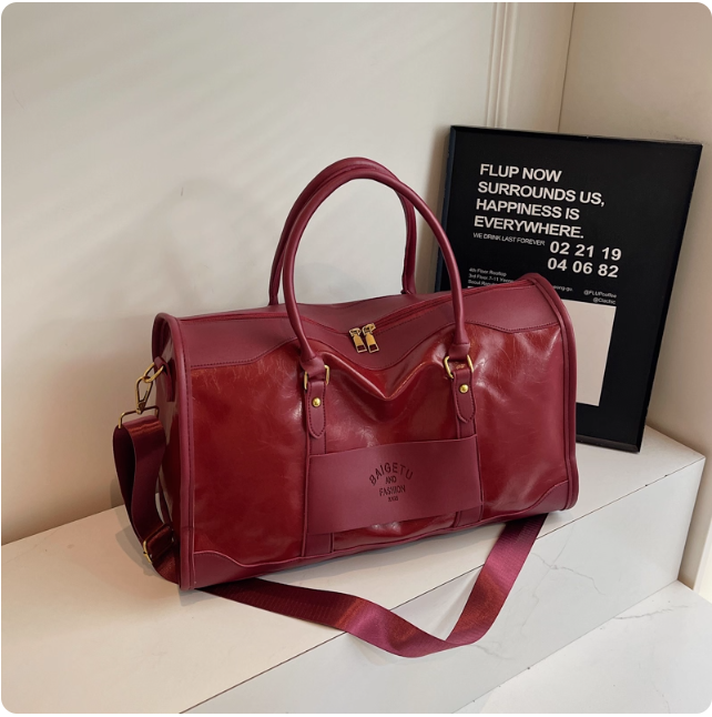 Sac de voyage en cuir rouge