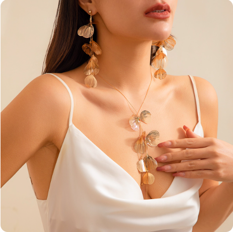 Parure de bijoux feuilles dorées