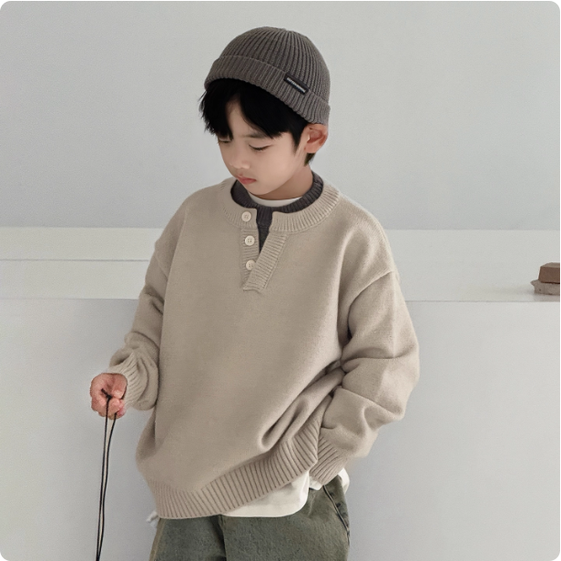 Pull en tricot beige pour enfant