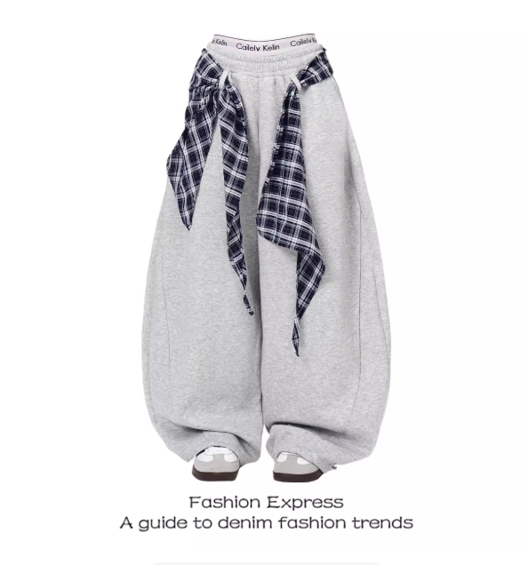 Pantalon large gris avec ceinture à carreaux