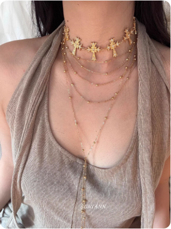 Collier multi-rangs à croix dorées