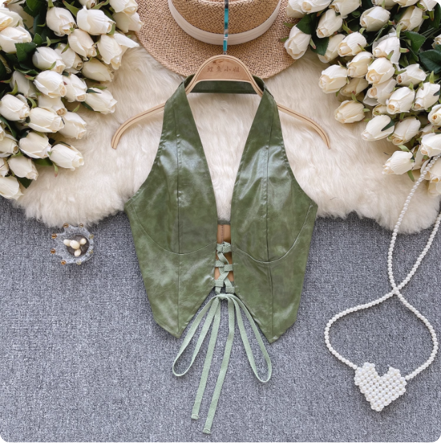 Gilet vert en similicuir