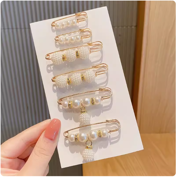 Broche à perles pour ajuster la taille du pantalon