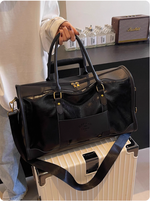 Sac de voyage en cuir rouge