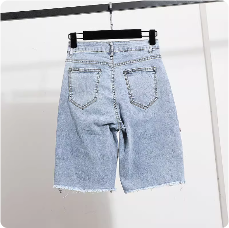 Short en jean brodé