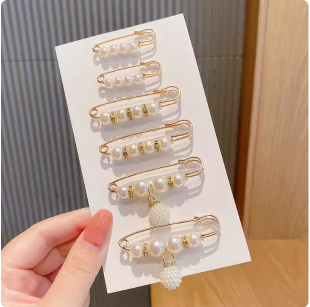 Broche à perles pour ajuster la taille du pantalon