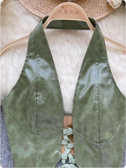 Gilet vert en similicuir