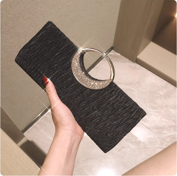 Pochette élégante à poignée circulaire