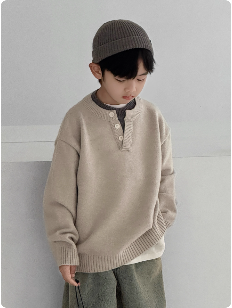 Pull en tricot beige pour enfant