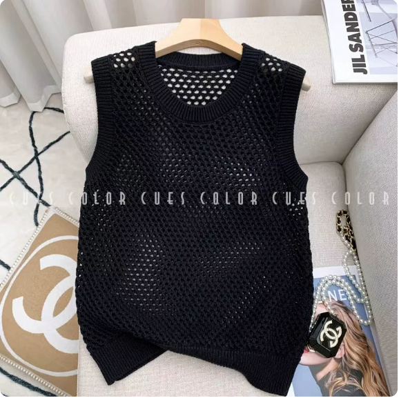 Pull sans manches maille ajourée vert