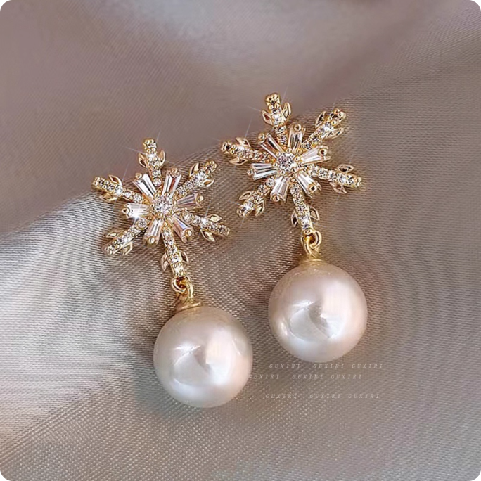 Boucles d’oreilles en perle et or