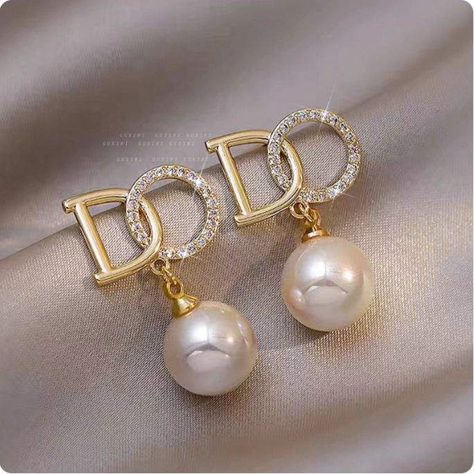 Boucles d’oreilles en perle et or
