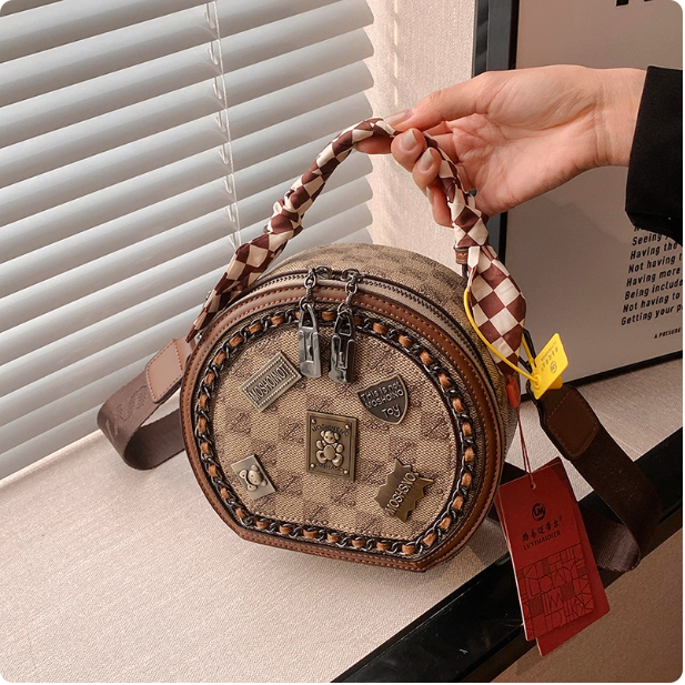 Sac à main rond à motifs