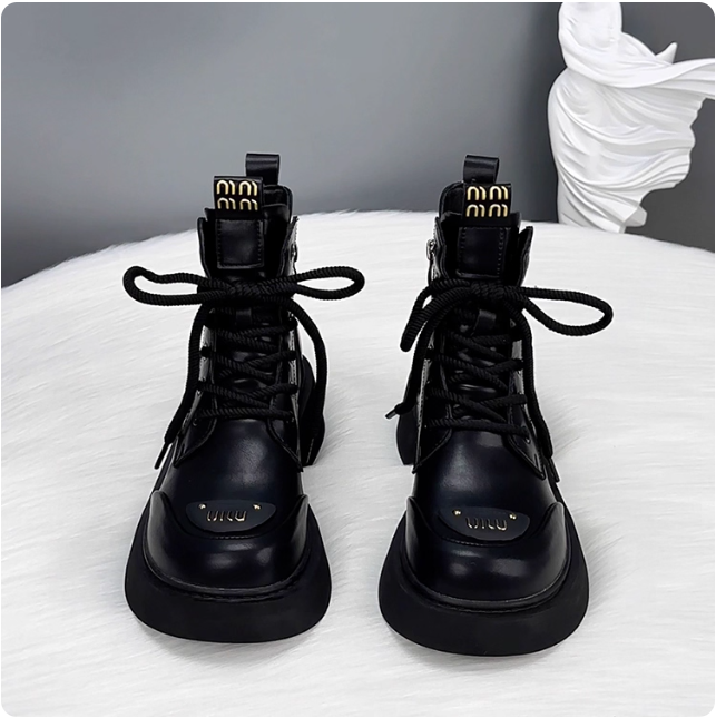 Bottes en cuir Miu Miu