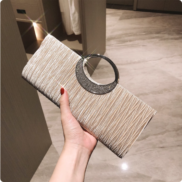Pochette élégante à poignée circulaire