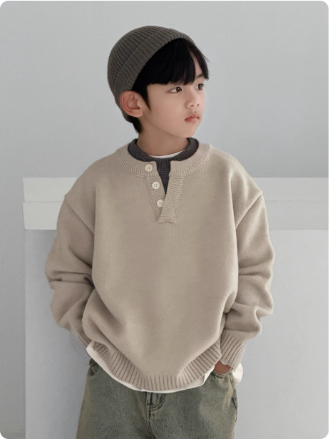 Pull en tricot beige pour enfant