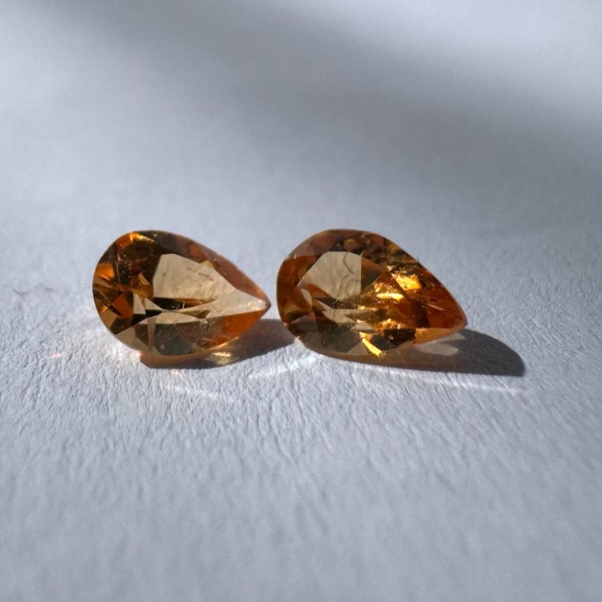 1.2 ct. pair of orange garnets (0.6 ct. each)