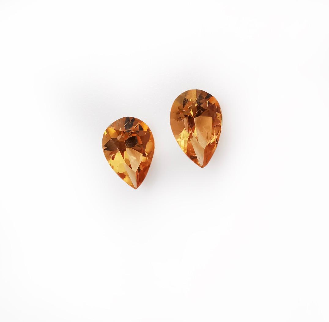 1.2 ct. pair of orange garnets (0.6 ct. each)