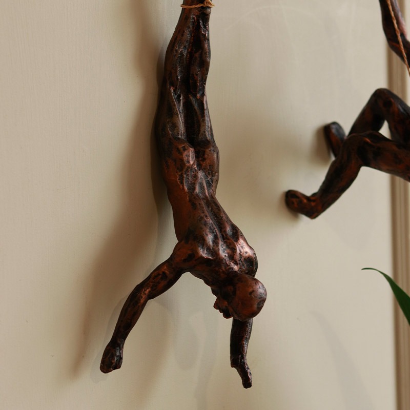 Hanging Man - Golden Wall Décor | ArteCasa | Resin Sculpture 