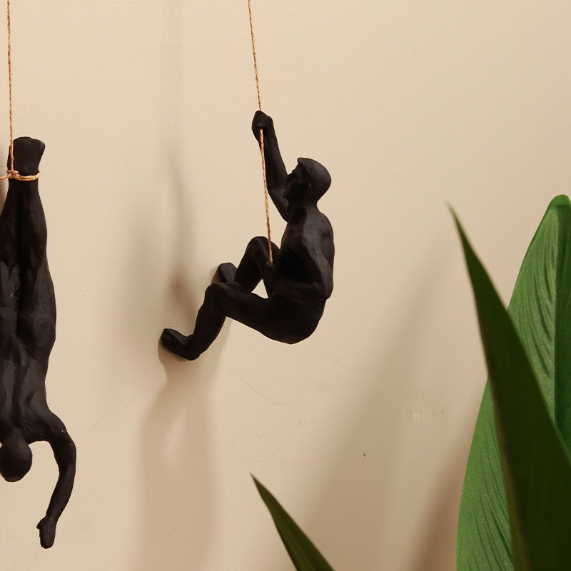 Hanging Man - Golden Wall Décor | ArteCasa | Resin Sculpture 