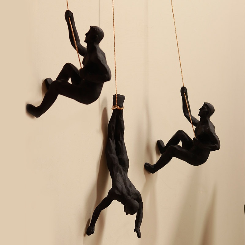 Hanging Man - Golden Wall Décor | ArteCasa | Resin Sculpture 