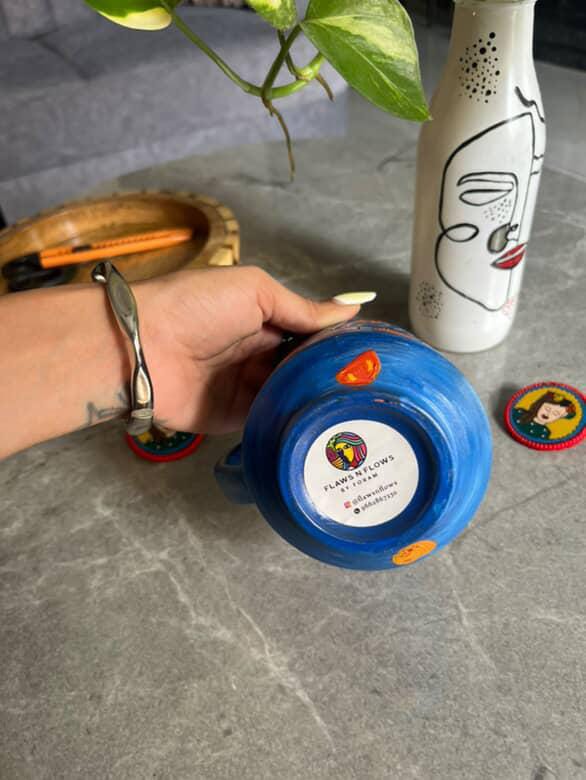 Hand-Painted Blue Terracotta Mug with Orange Motifs – ₹675