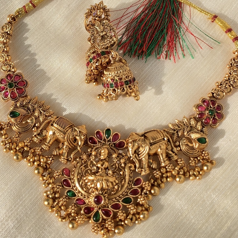 Brass necklace set with stones and earrings 