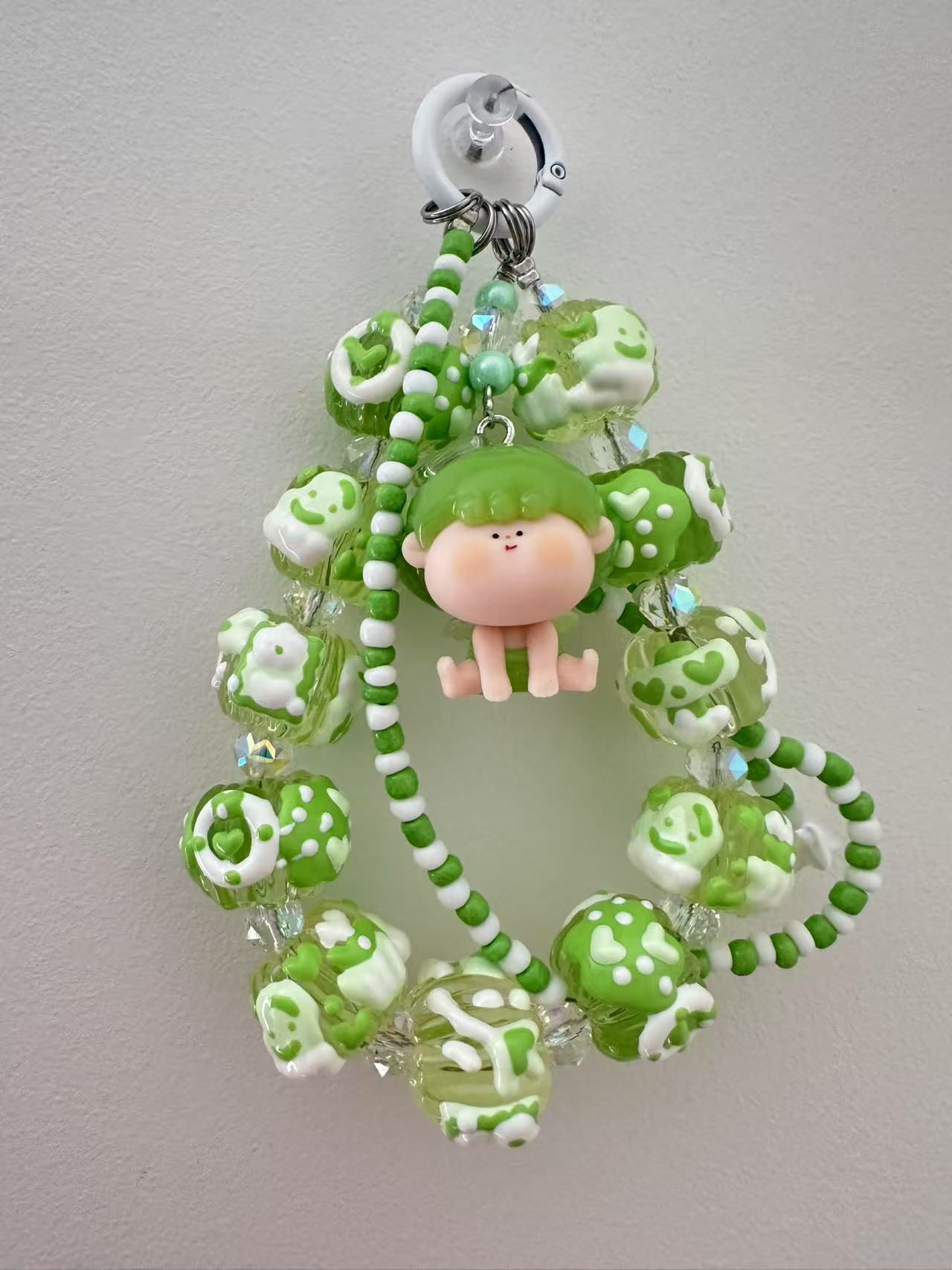 Green Beaded Keychain with Cute Character Charm