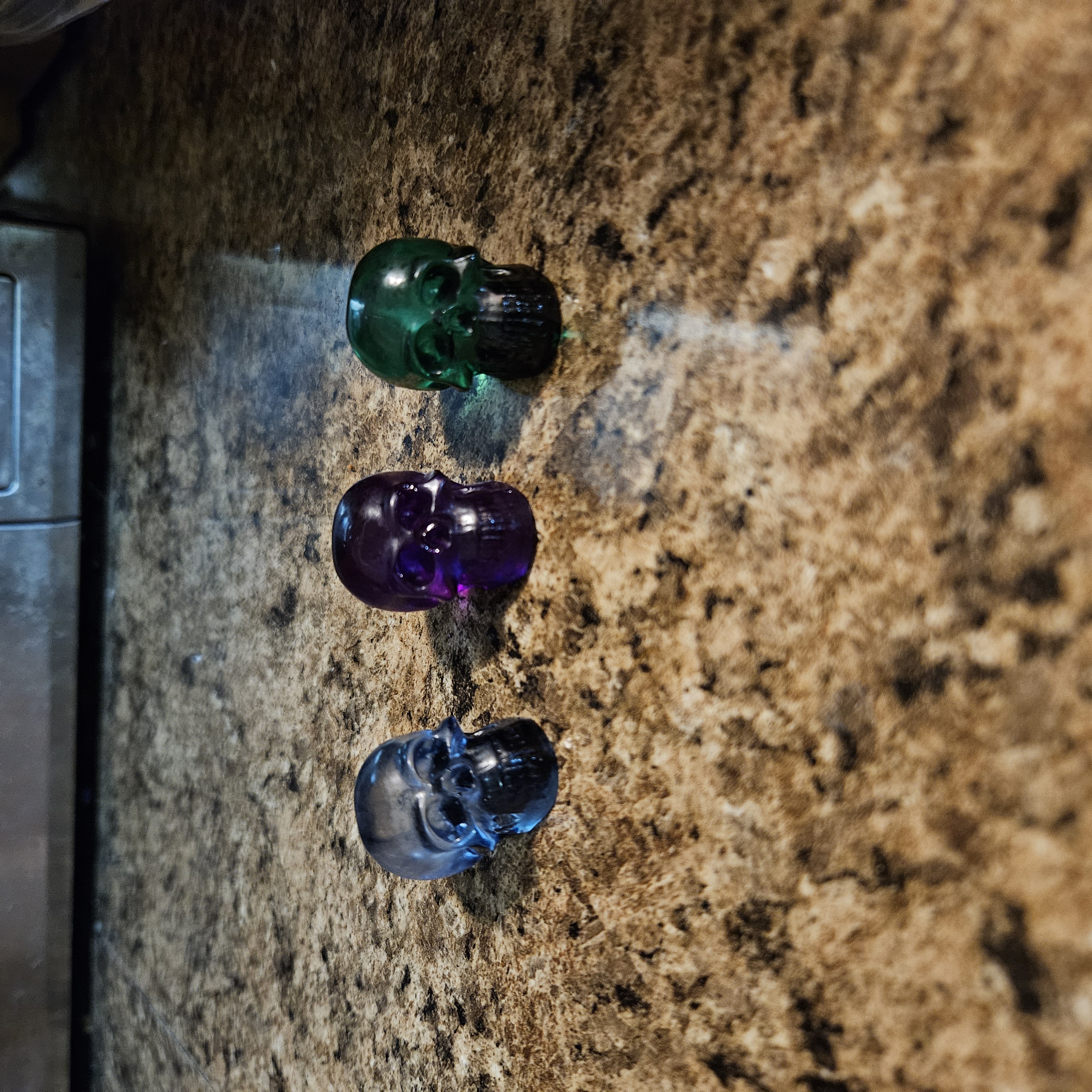 Colored Glass Skull Figurines