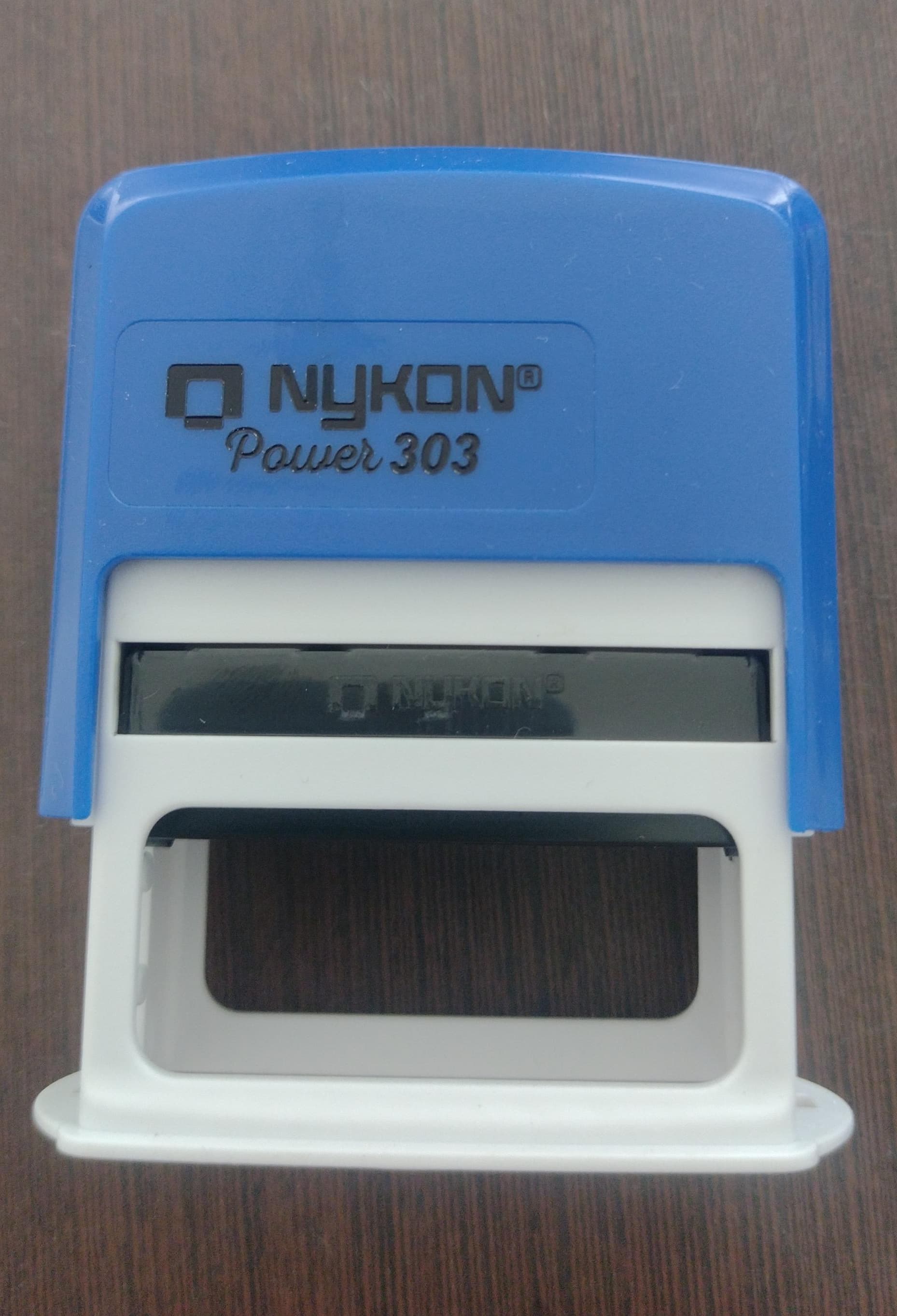 Carimbo autoentintado Nikon 303