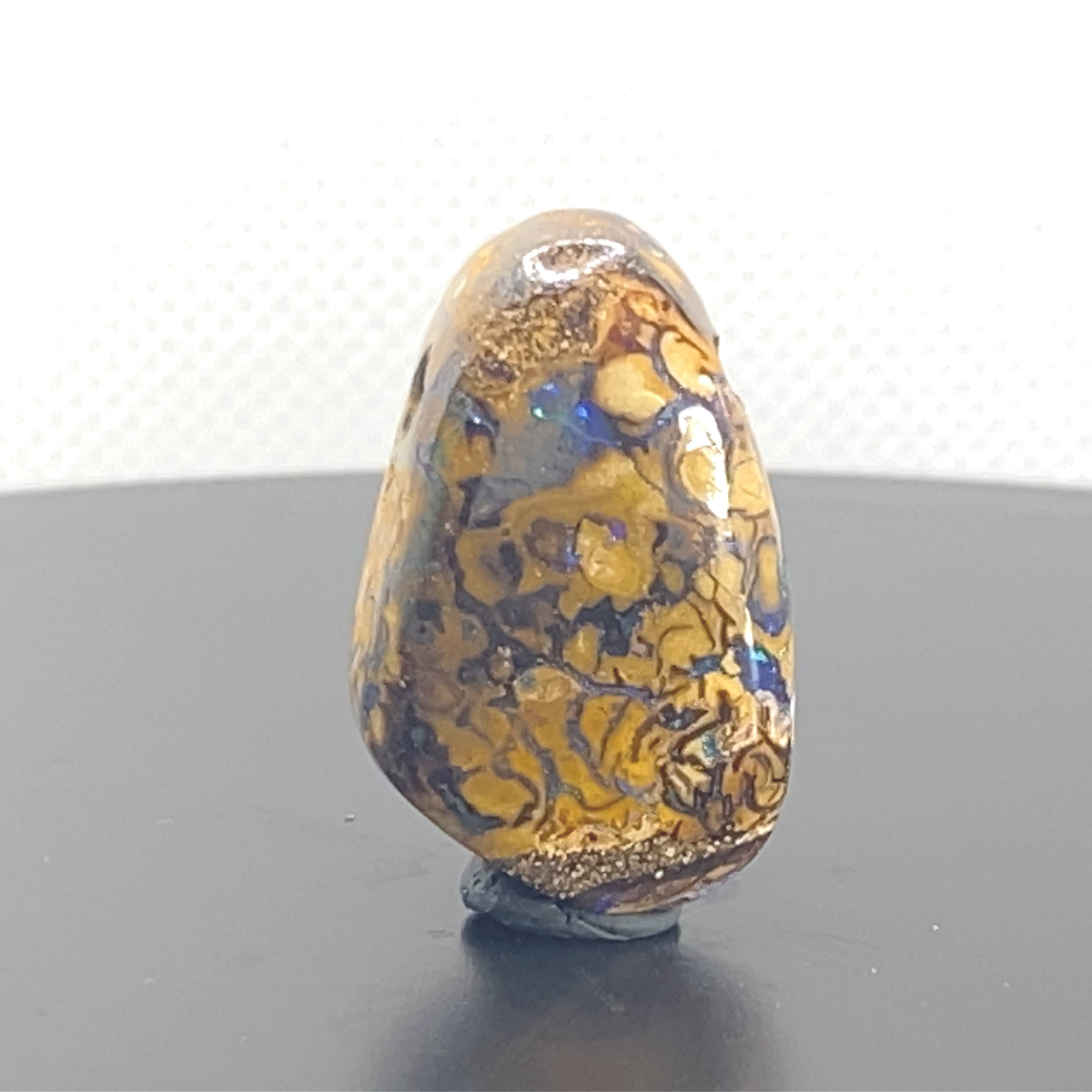 A flicker of earth and light.