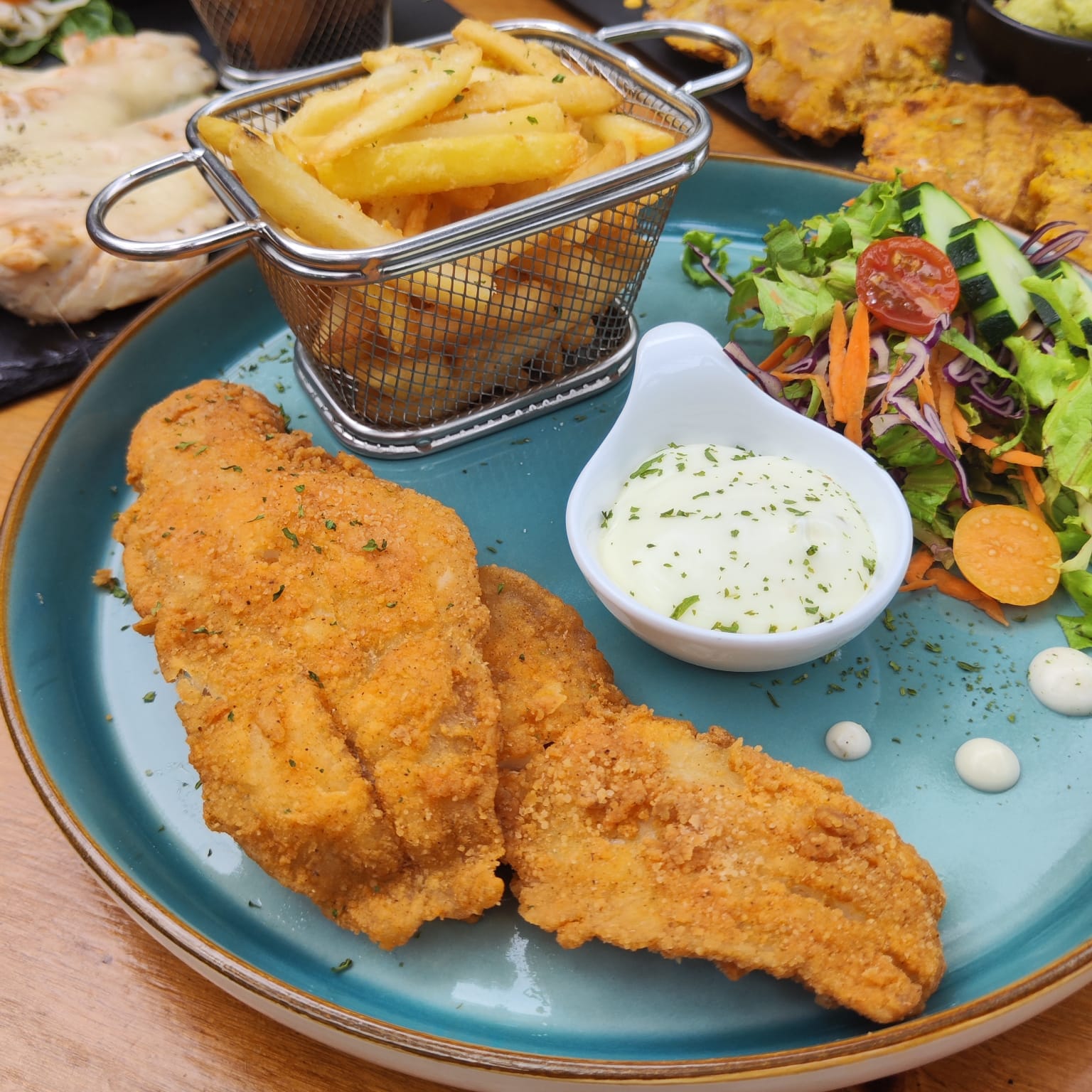 Corvina a la milanesa