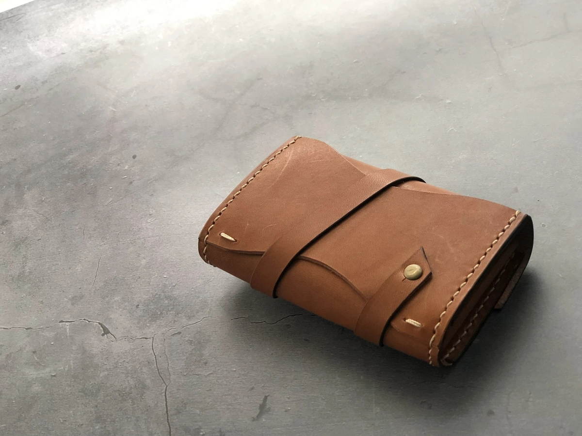 Handmade strap-wrapped card wallet