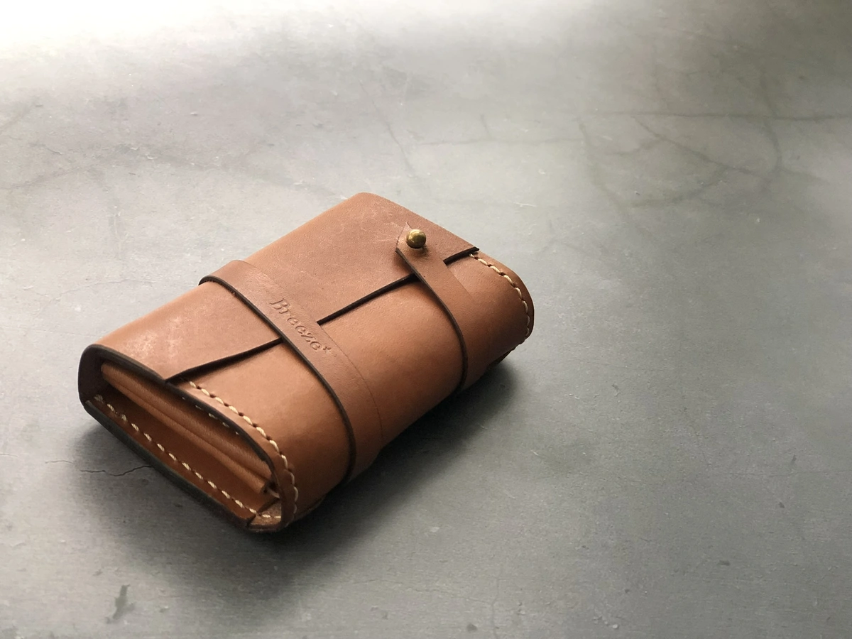 Handmade strap-wrapped card wallet