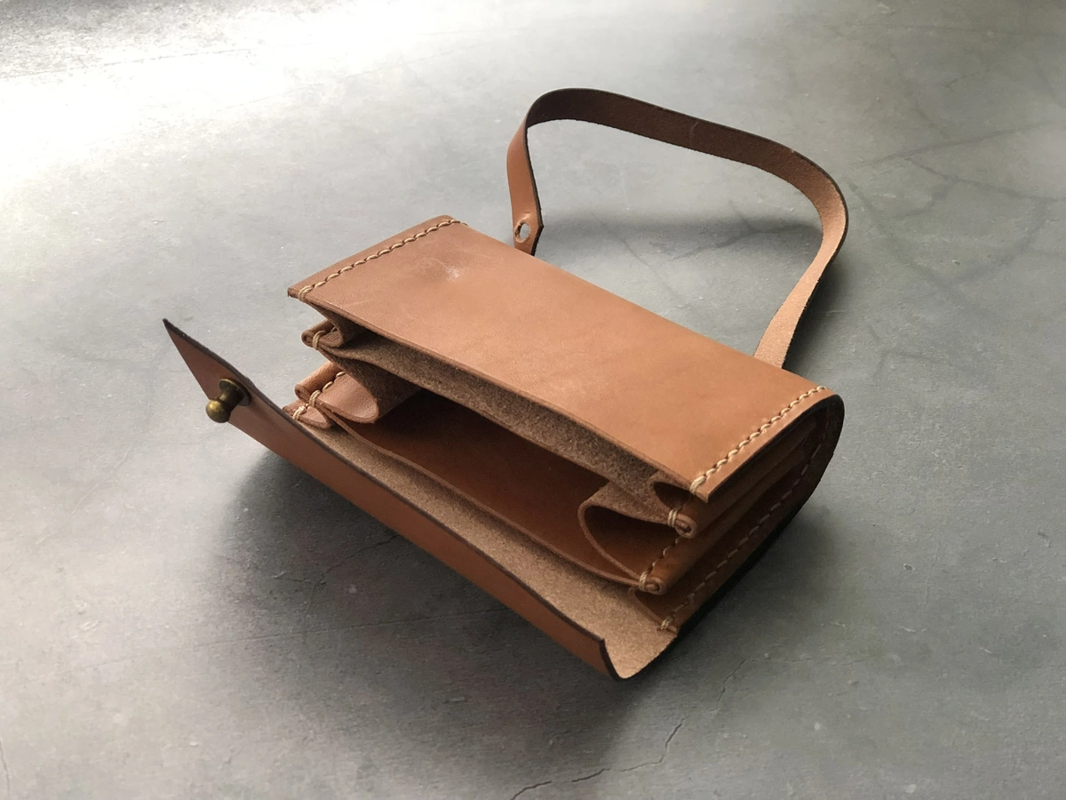 Handmade strap-wrapped card wallet
