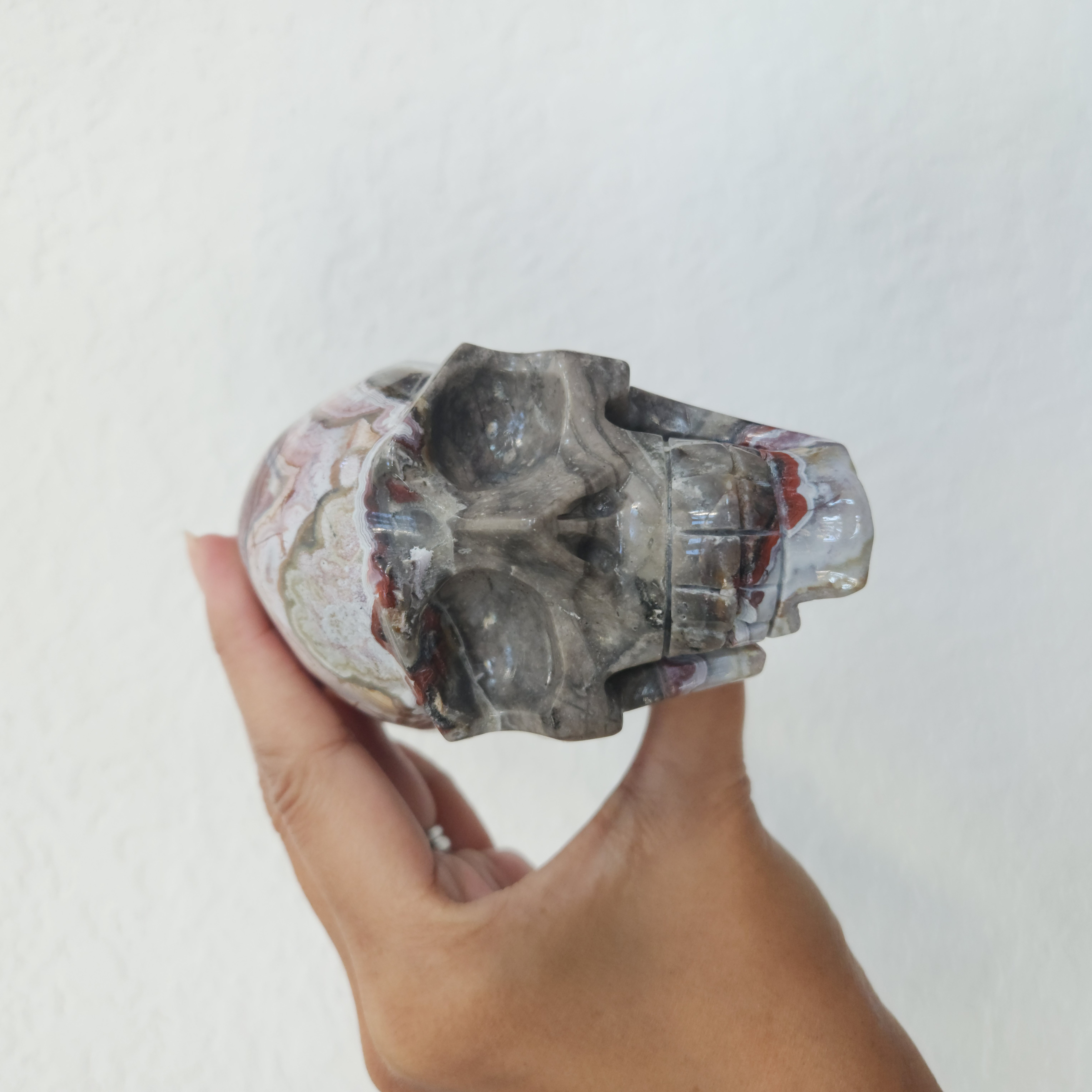 Mexican Lace Agate Skull - Red Mexican Crazy Lace Agate Skull crystal 