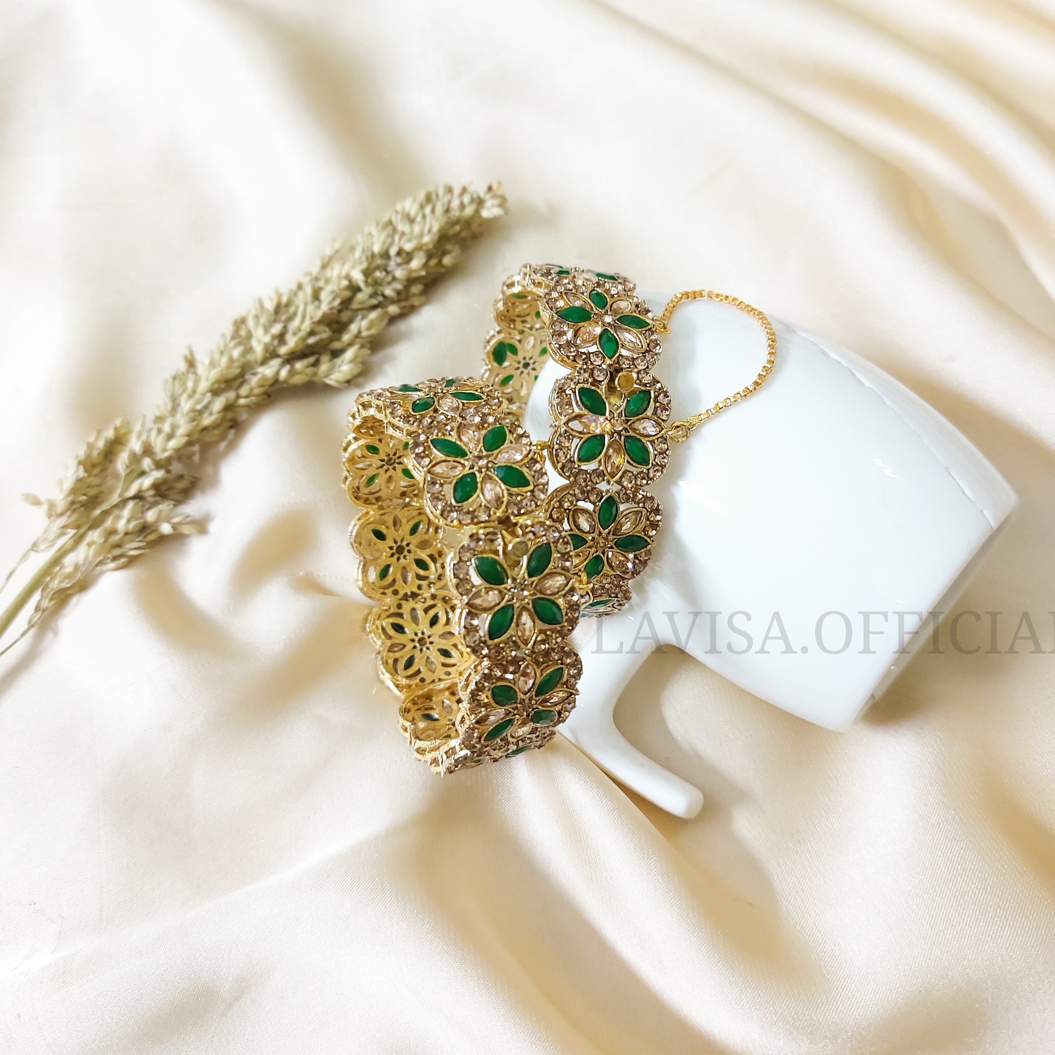 Gold and Emerald Bangles