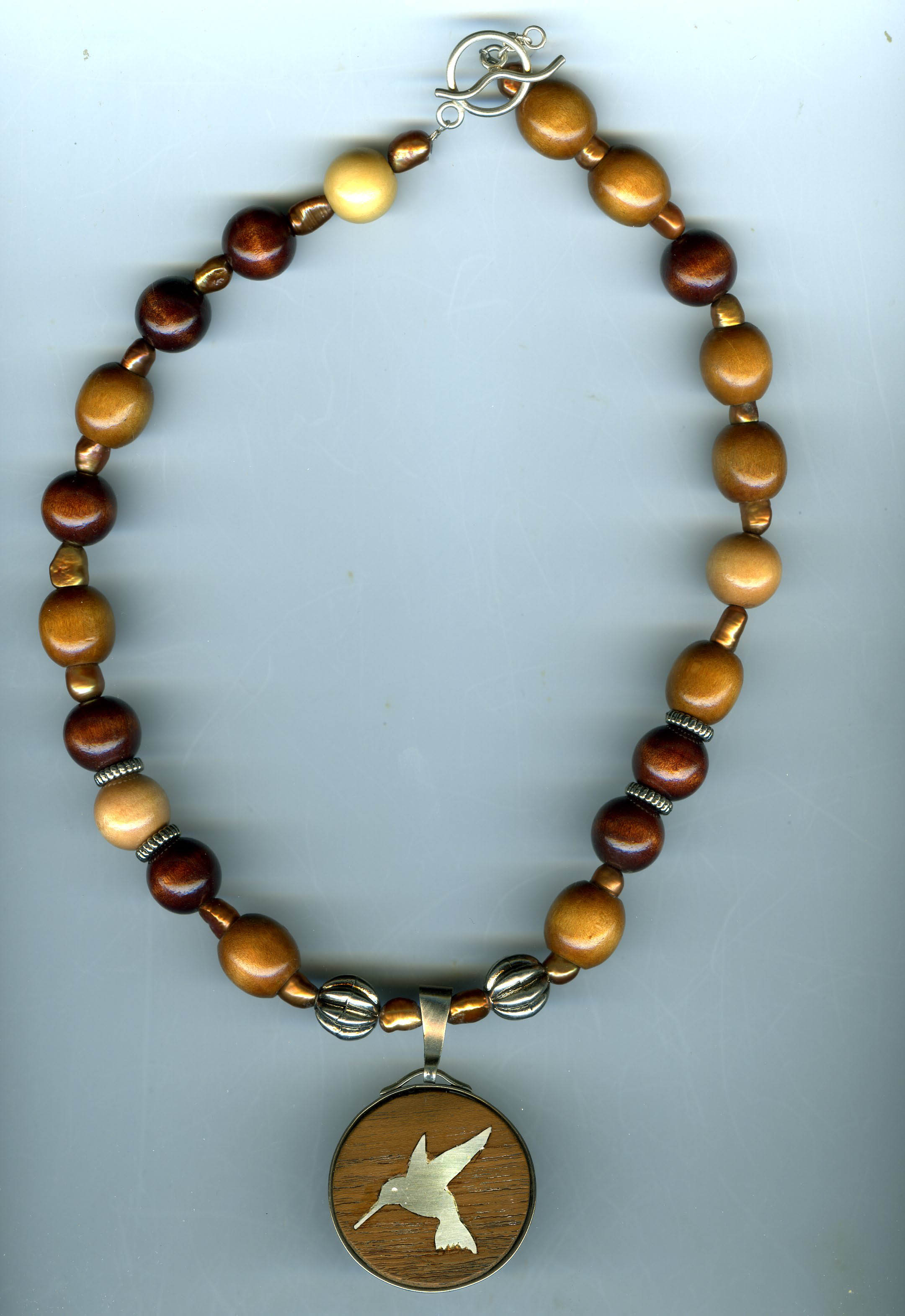 Hummingbird Pendant on Wood Beaded Necklace