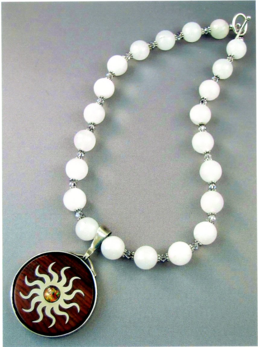 Fiery Sun Pendant on Beaded Necklace