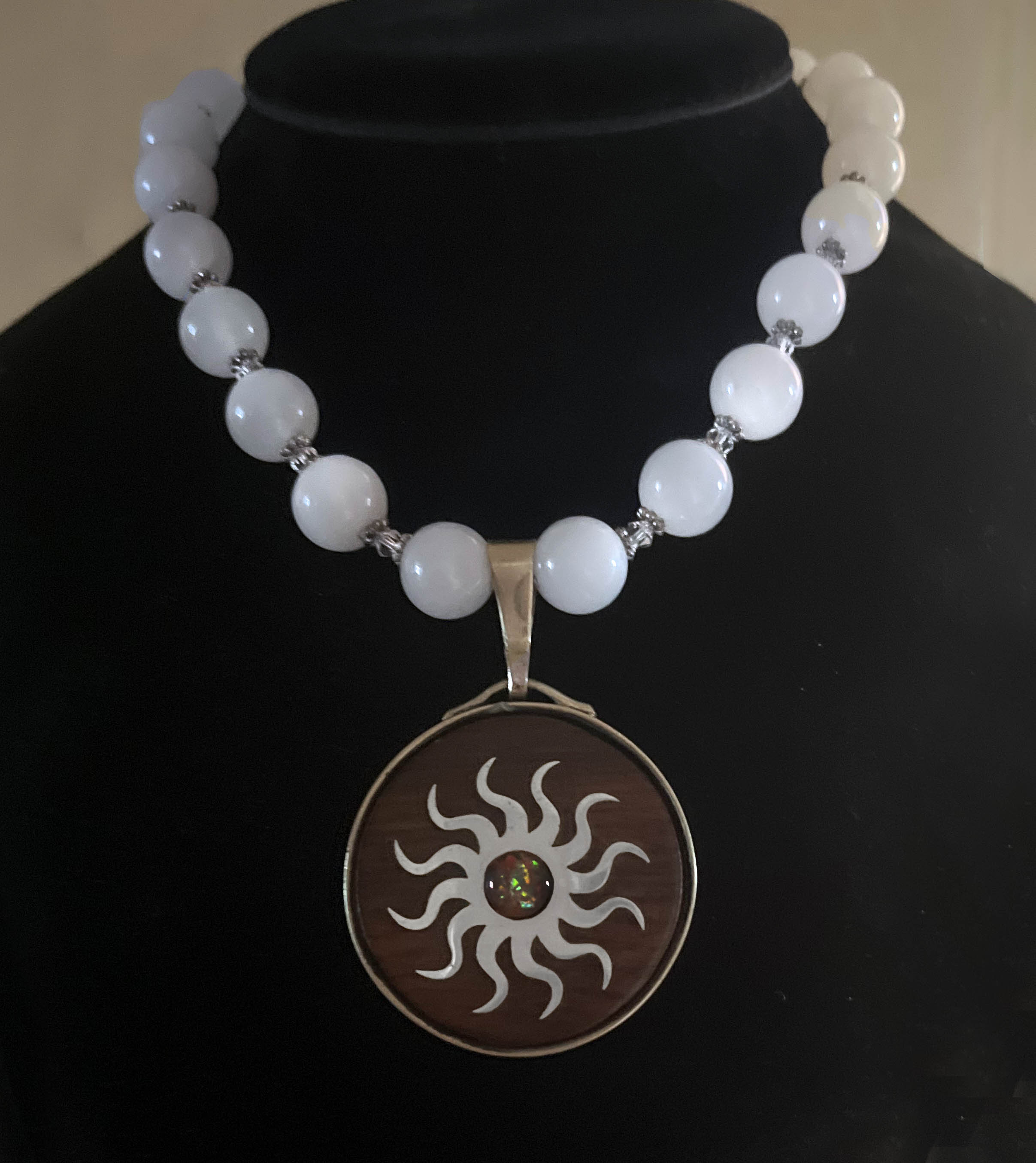 Fiery Sun Pendant on Beaded Necklace