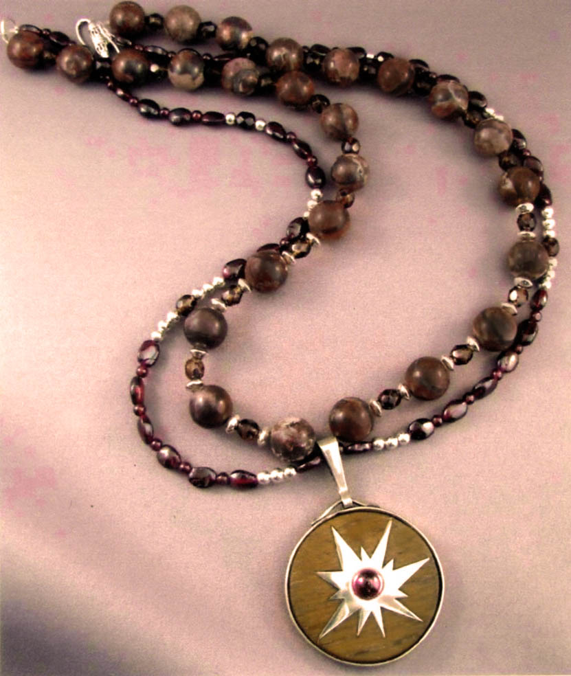 Garnet and Stone Sun Pendant Necklace