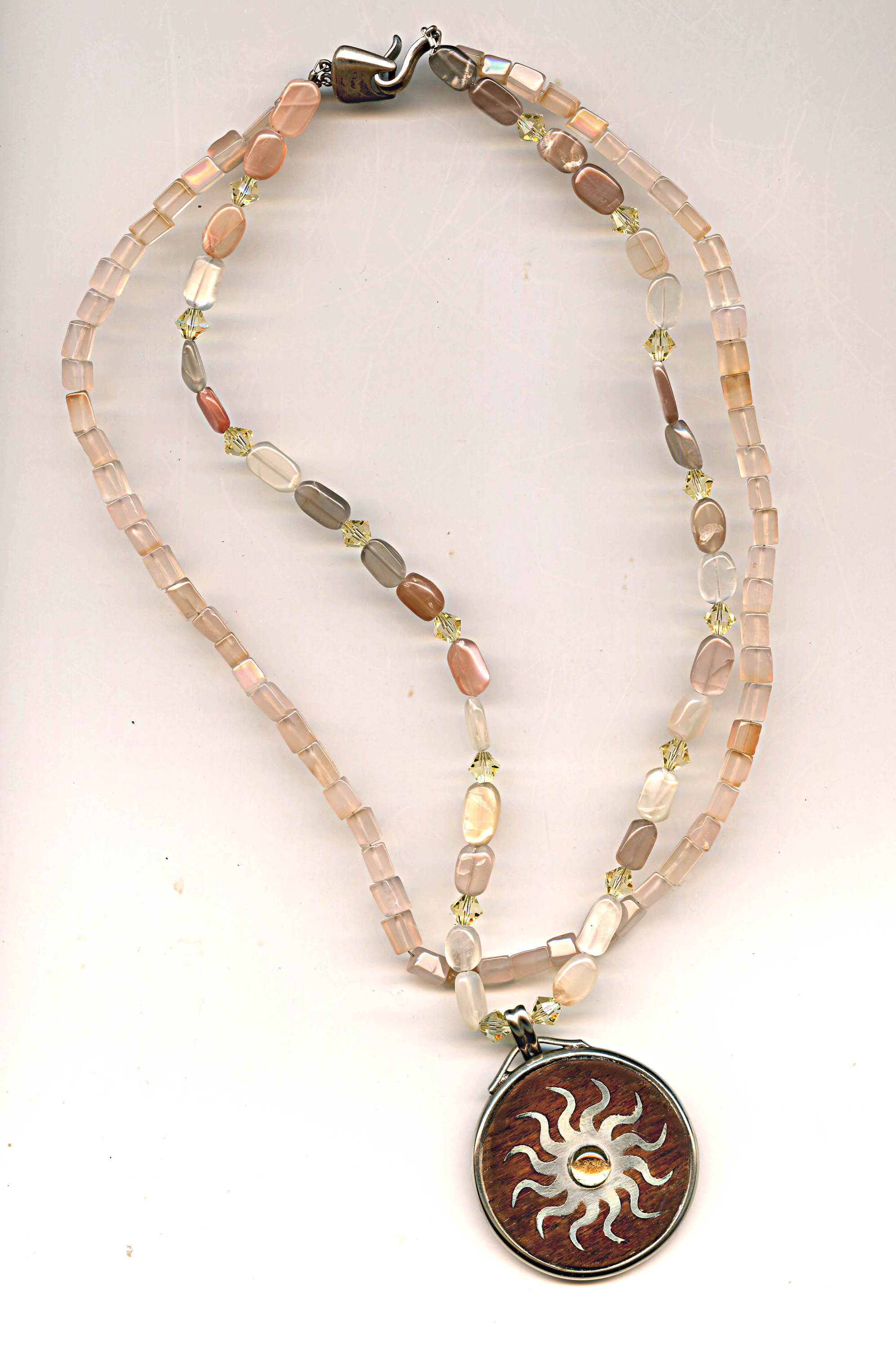 Sun Motif Pendant on Quartz Beads