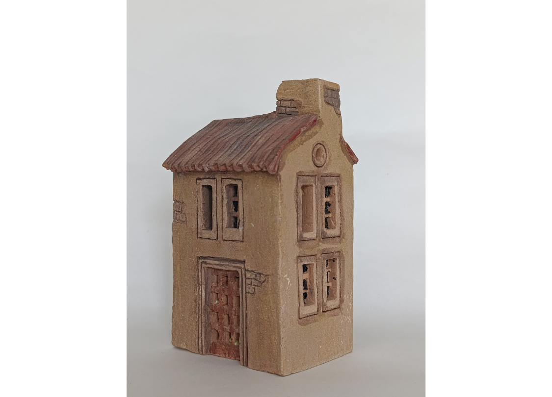 Cubre velas con forma de casa