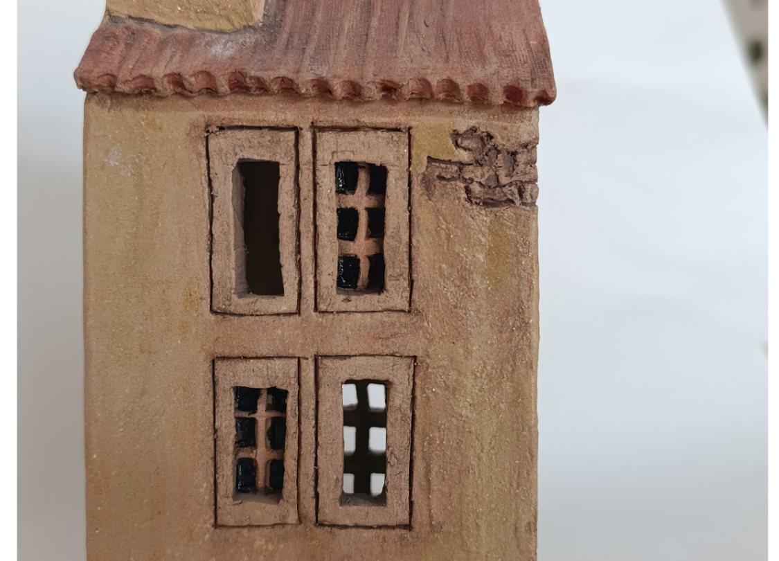 Cubre velas con forma de casa