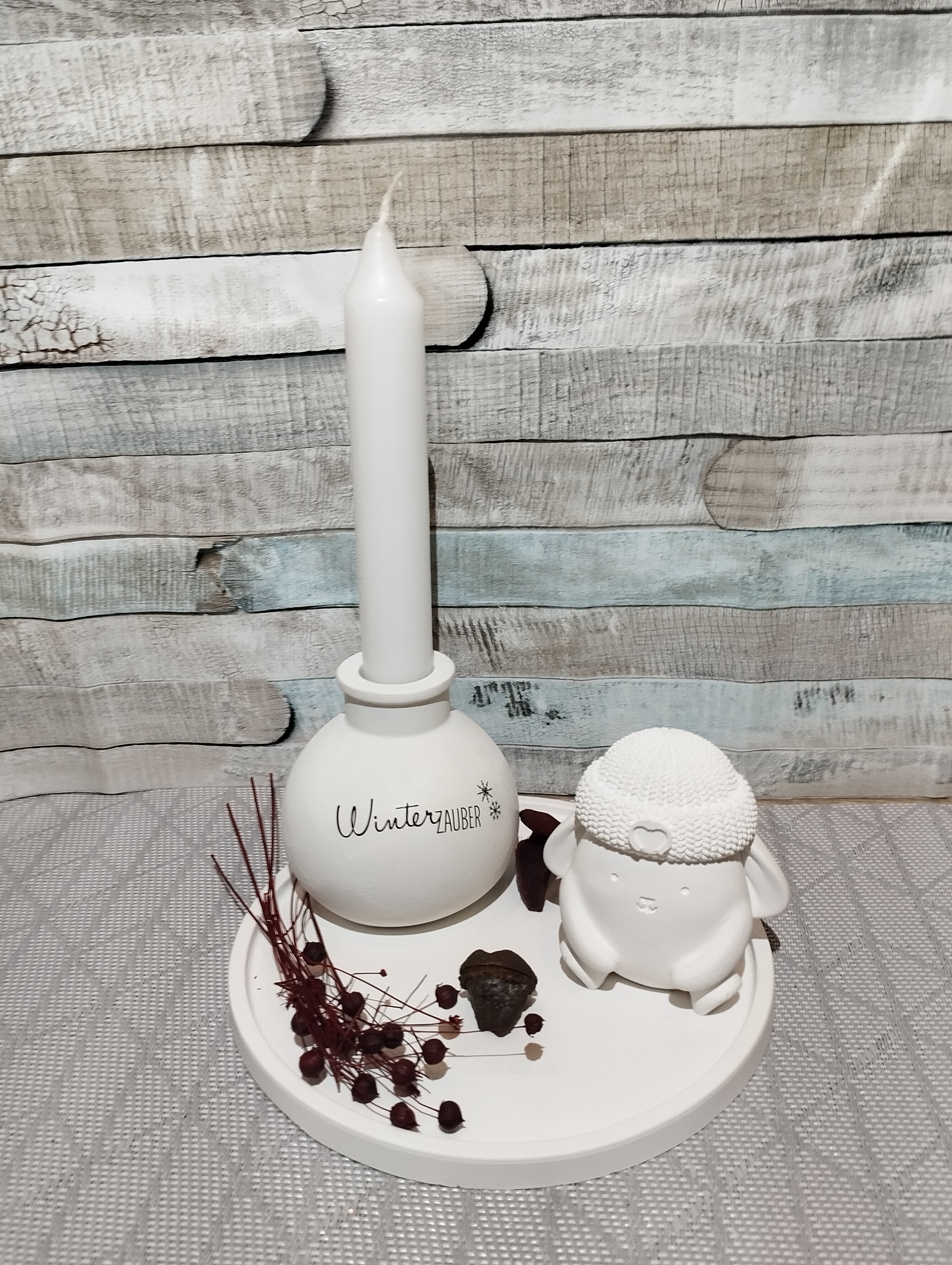 Weihnachtliche Kerzendekoration