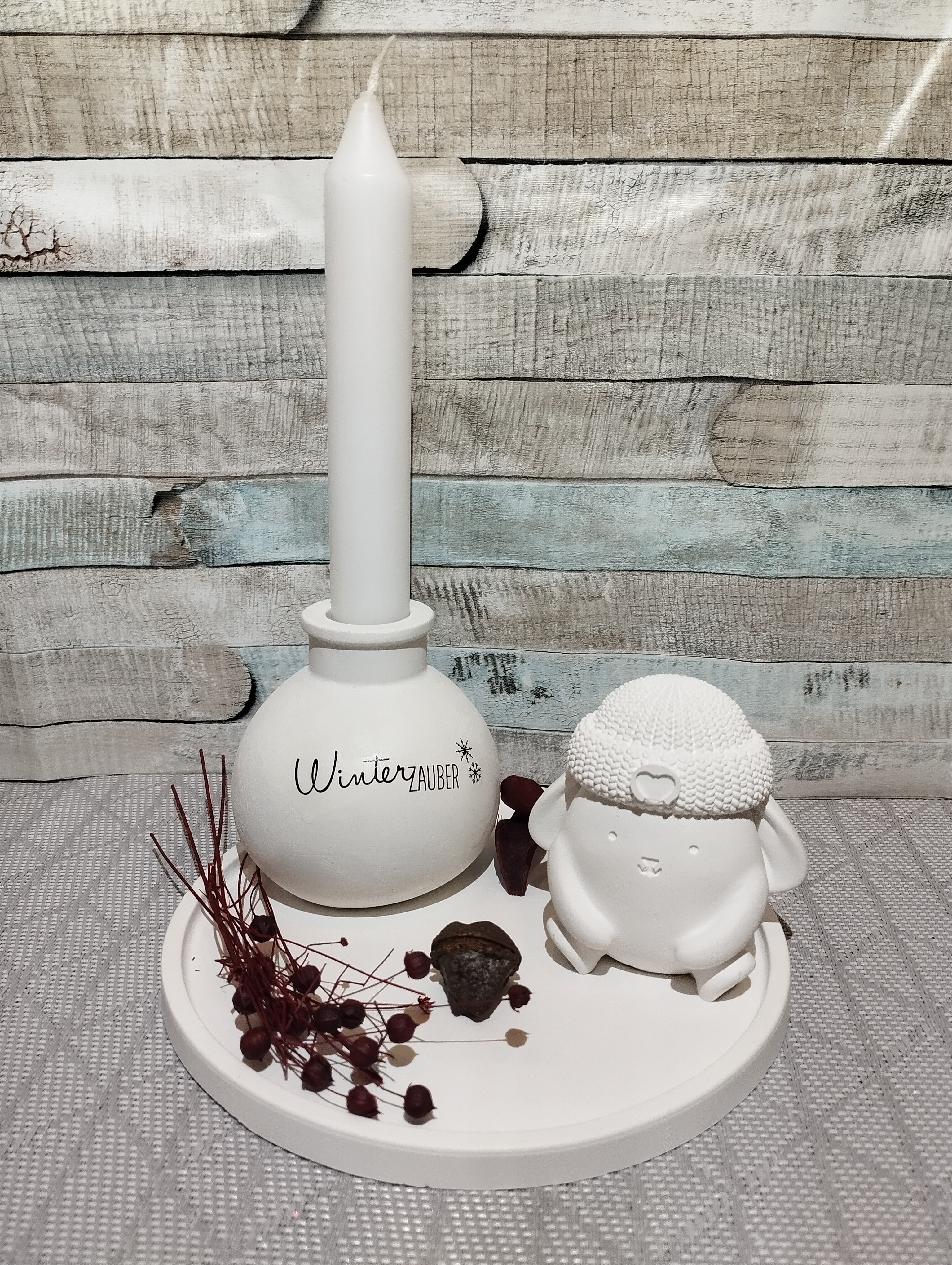 Weihnachtliche Kerzendekoration